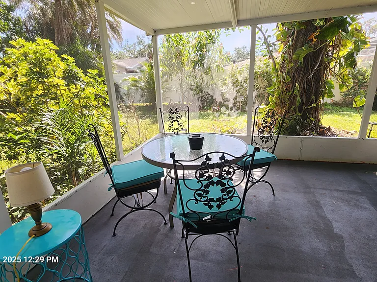screened, private lanai with table for outside dining and morning coffee