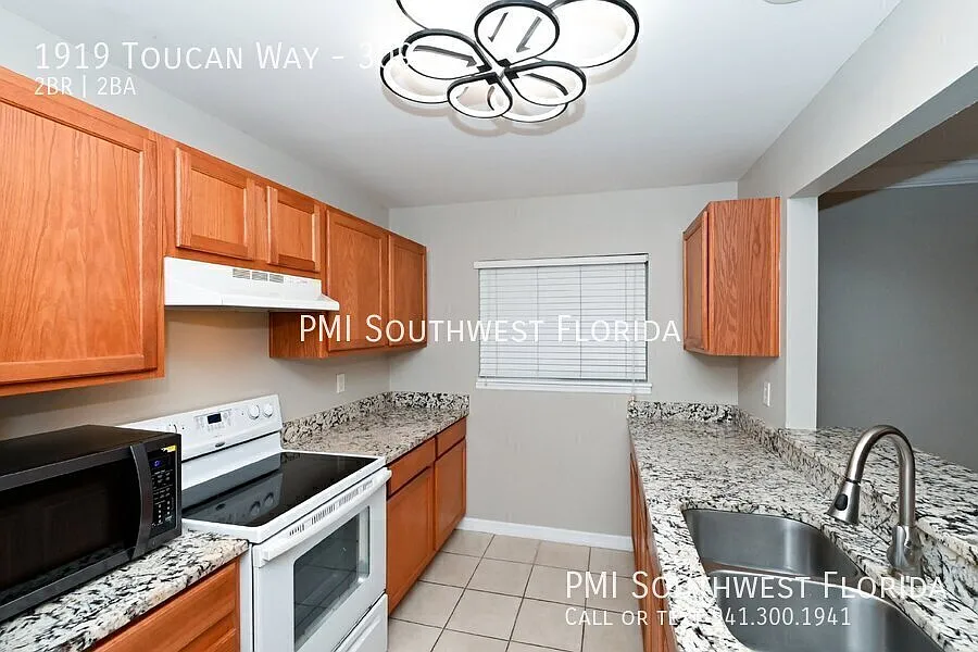 Building Photo - 1919 Toucan Way #309