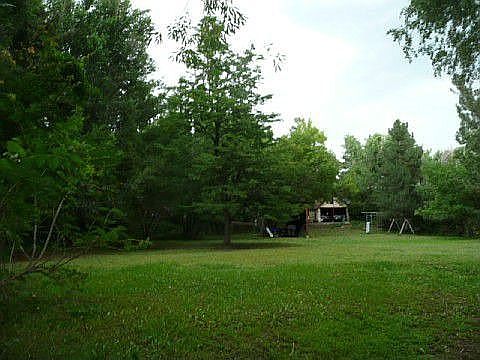 Huge 9 acre lot with well and mature landscaping