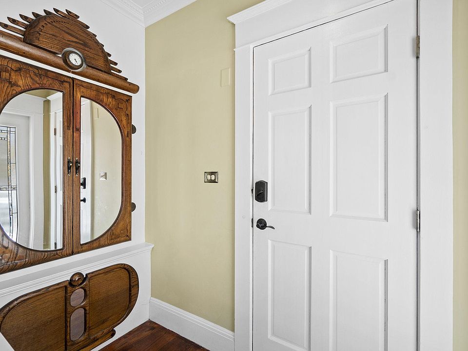 Built-in coat and shoe storage just inside the entrance to the unit.