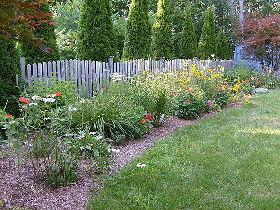 Large Perennial Garden In Rear