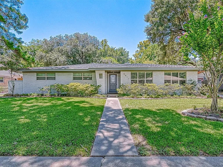 5611 Briarbend Dr — Photo 1
