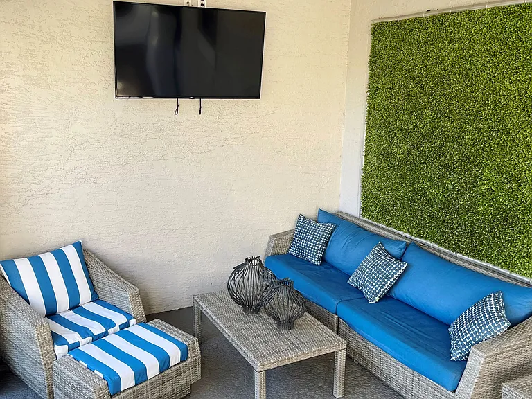 Unwind in our cozy outdoor media lounge, where you can relax with neighbors or cheer on your favorite team. The perfect spot to gather and unwind!