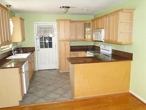 View looking into the kitchen from Breakfast area