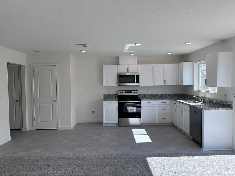 7760 Forestdale Way — Photo 2