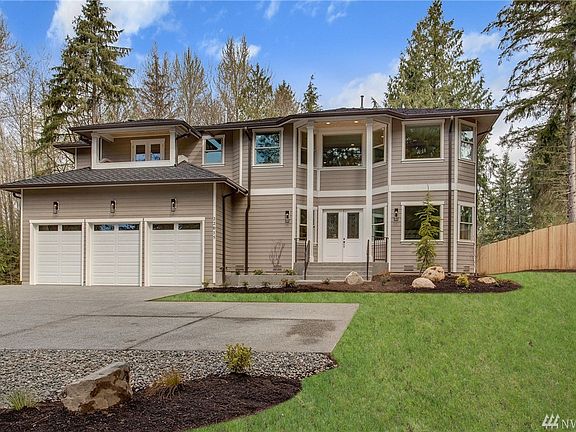 Located just minutes to Woodinville but away from neighborhood congestion. This 5656 square foot home is beautifully situated on lovely lot with old growth conifer trees.
