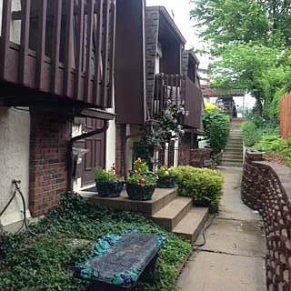 Inside garden walkway and main entrance door to building. - 613 N Pleasant St #LALAS LLAMA