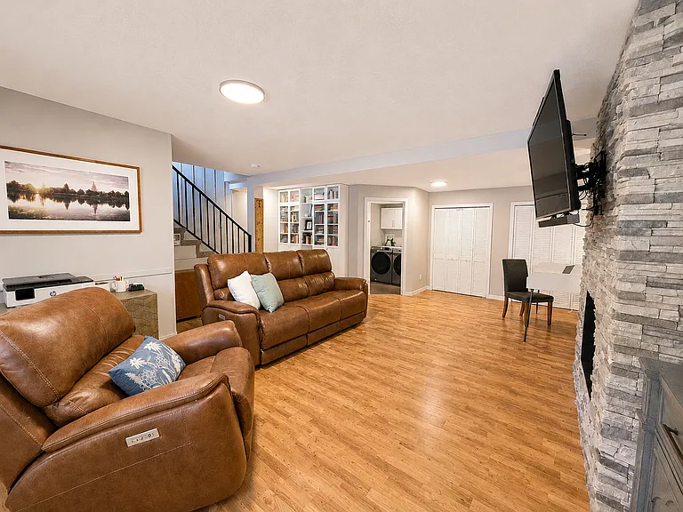 Family Room - Daylit Basement - Gas Fireplace - Large amount of Storage - Murphy Bed/Desk Office Area interchangeable - Adaptable for use as a Guest Suite with its own Bathroom.