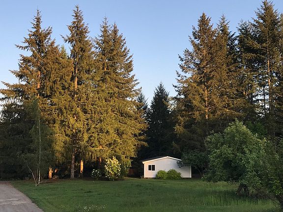 Looking down at the house from about half way down the driveway.