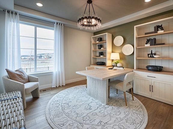 Off the entrance to the Quincy you ll find a spacious den flexible living space.