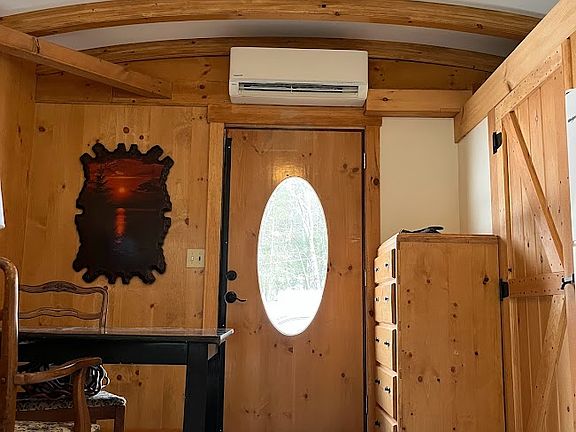 Front enterance,w/furnishings and right side closet.
