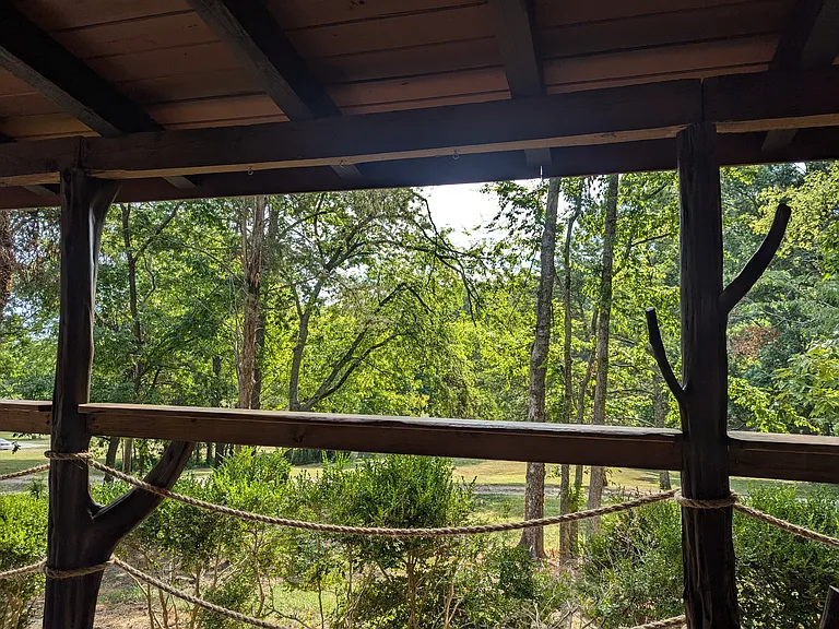 Take in the nature views on the covered front porch. (You may even catch a glimpse of the deer and turkeys that can sometimes be seen on the neighboring property!)