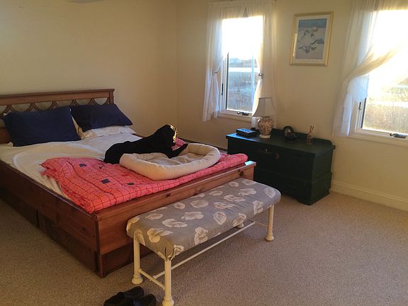 Master Bedroom w/ queen-sized water bed