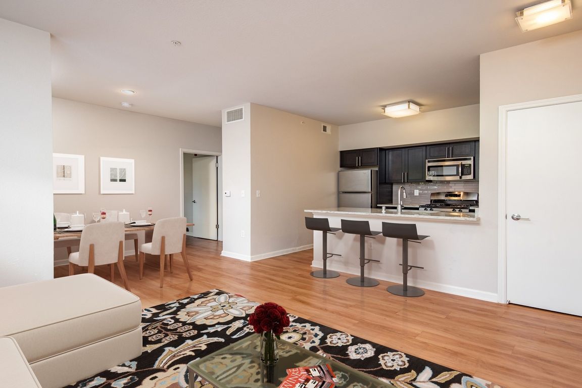 Beautifully updated kitchen that opens into the living room