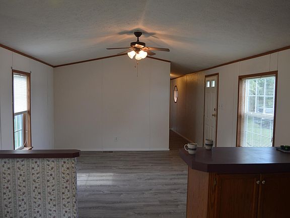 Kitchen looking into living room