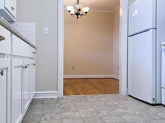 Kitchen opens into dining room
