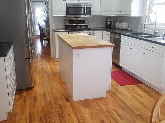 Glowing hardwood flr in updated kitchen