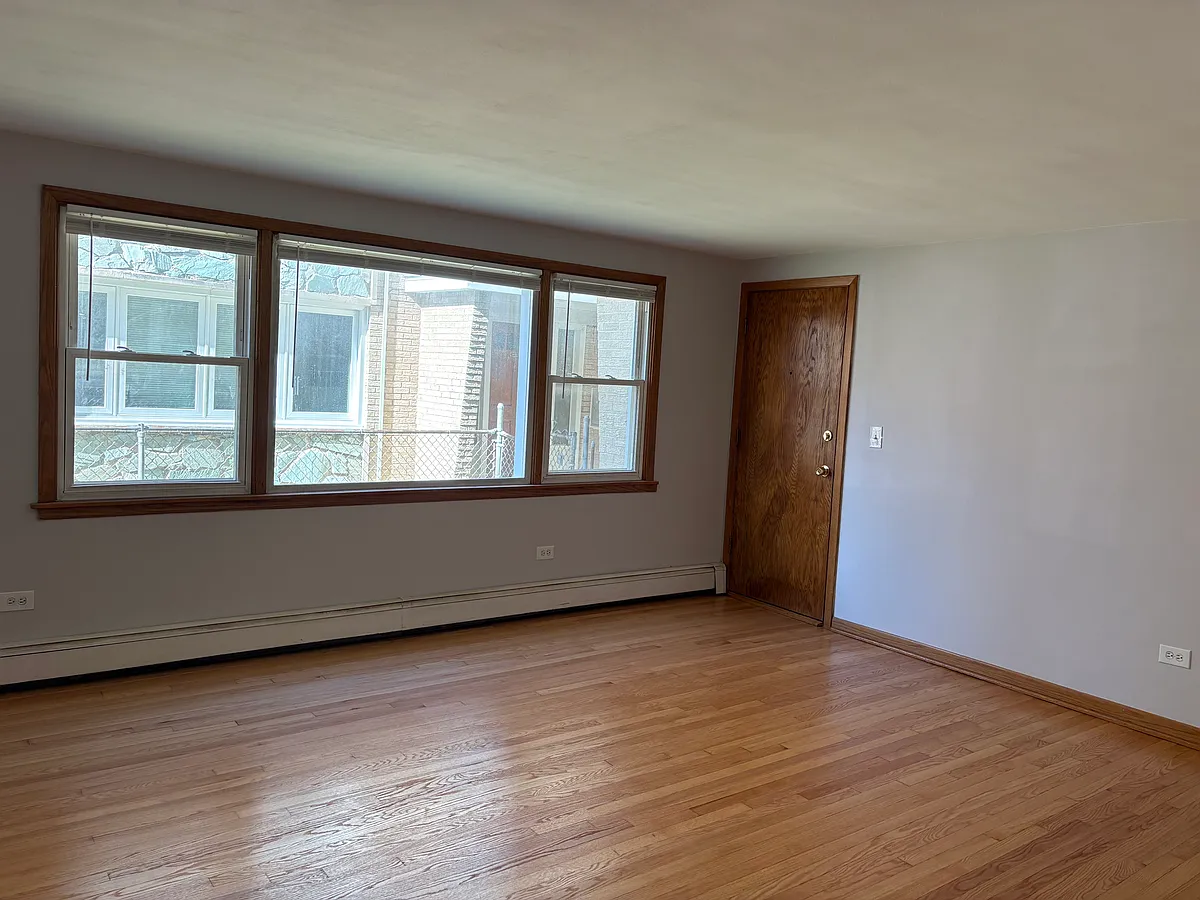 Building Photo - 5204 N Potawatomie Ave #1W