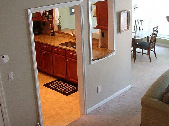 Warm rich colors and an open layout welcome you into this unique townhome.