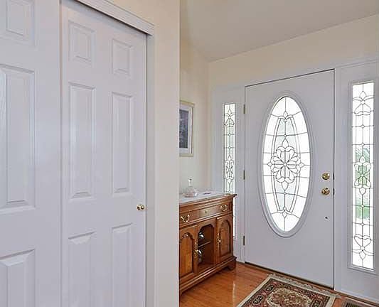 Front entry Foyer... Upgraded, leaded double side windows front door