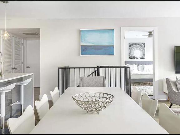 Dining Room, primary bedroom in background