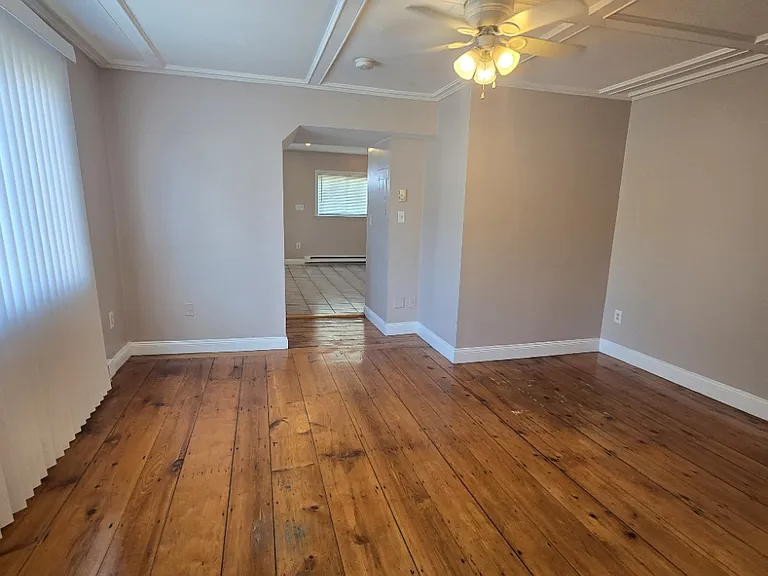 Living room looking into kitchen
