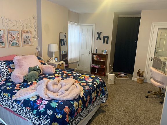 Master bedroom with his & hers closets