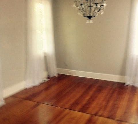 Hard wood floors downstairs and very bright