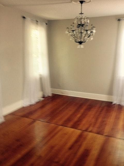 Hard wood floors downstairs and very bright