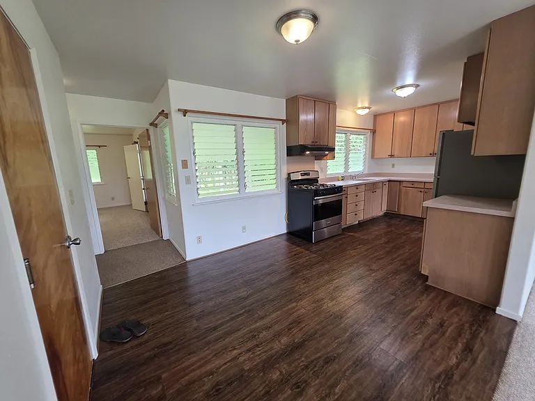 Dining area and kitchen with gas stove