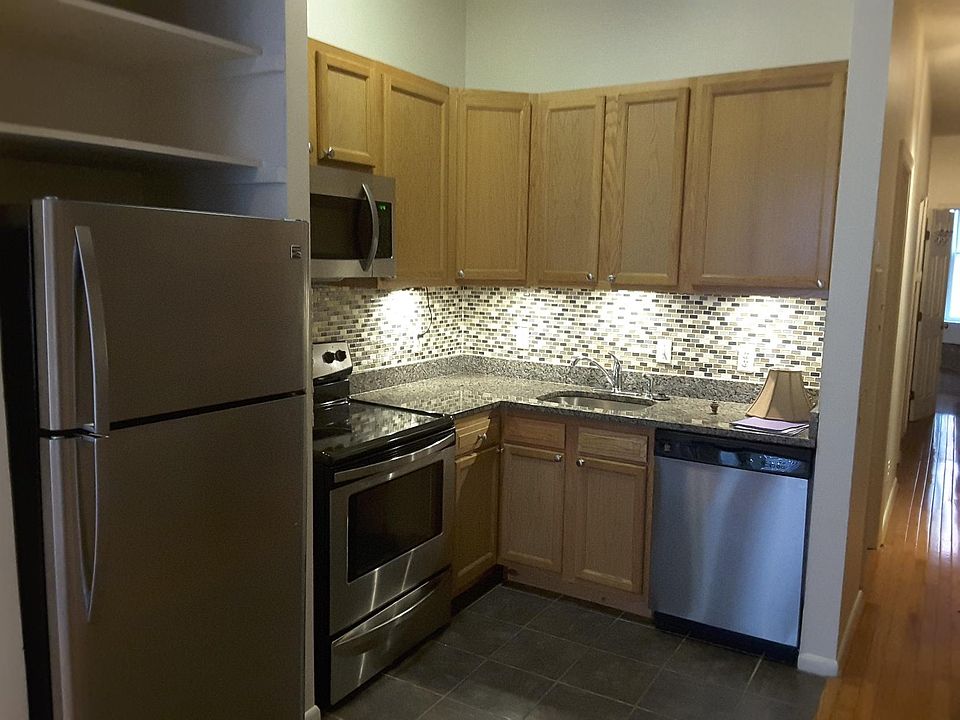 Kitchen will all stainless steel appliances and under-counter lighting. Includes a Dishwasher and microwave.