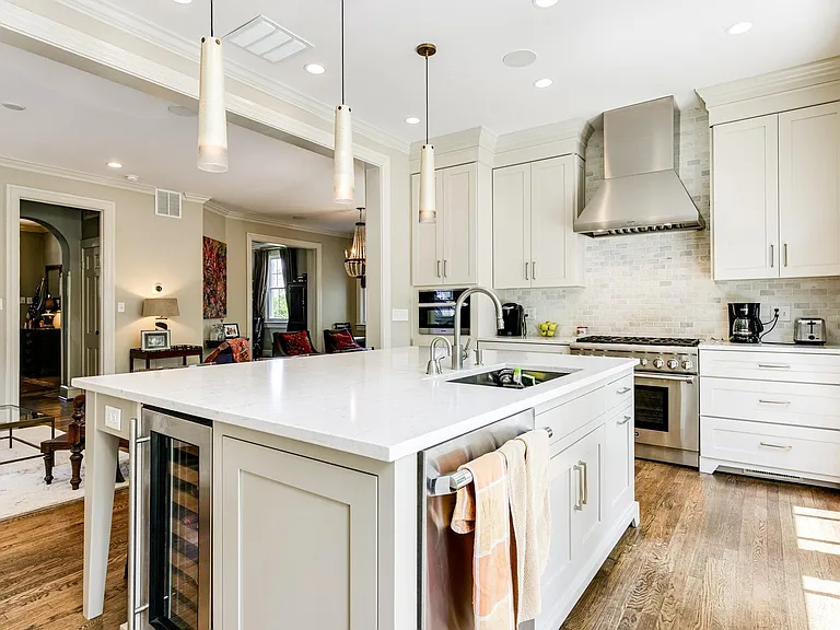 Gorgeous kitchen with Thermador gas stove, Thermador refrigerator and freezer columns, Miele Speed Oven and wine refrigerator.