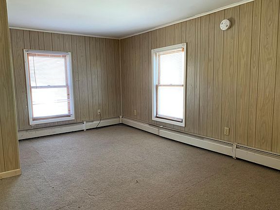Second bedroom also carpeted.