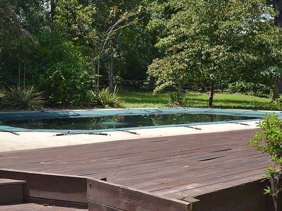 In ground pool and deck