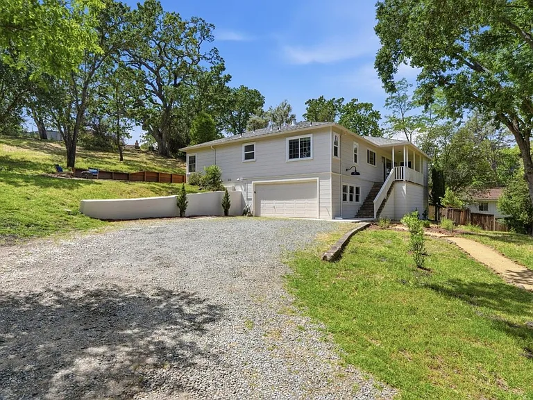 Long private driveway with ample parking
