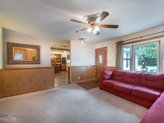 Living room looking into Dining / Kitchen area.