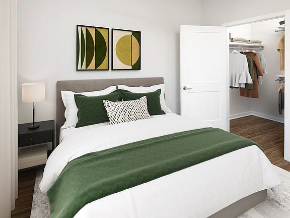 Bedroom with hard-surface vinyl plank flooring