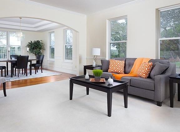 Formal living into formal dining with beautiful views.