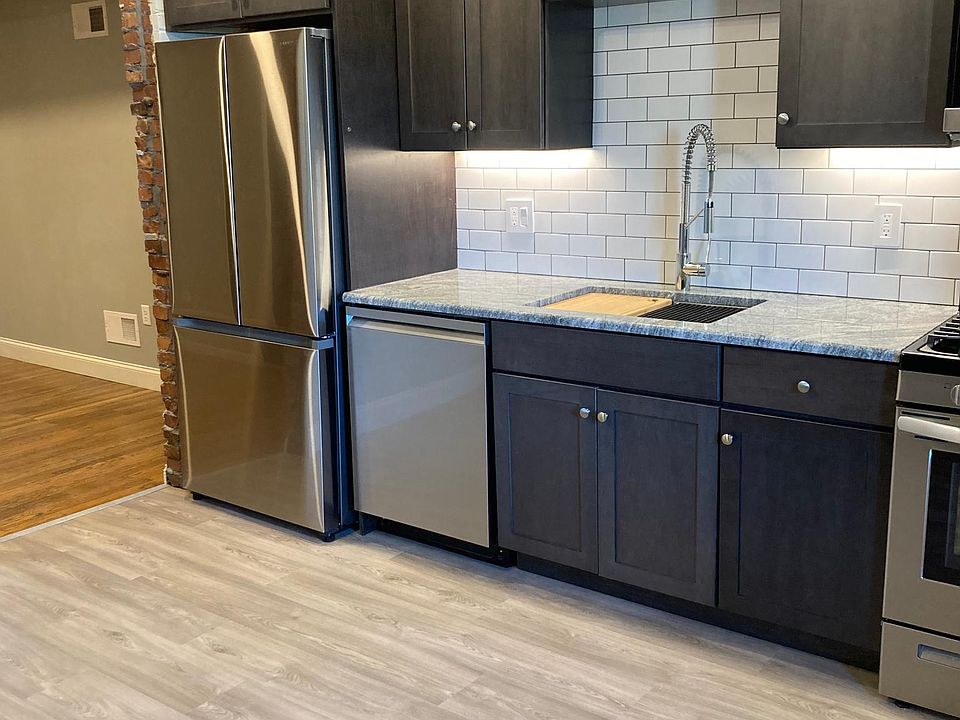Kitchen with view of living room