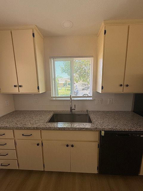 Beautiful kitchen with brand new sink and countertops.