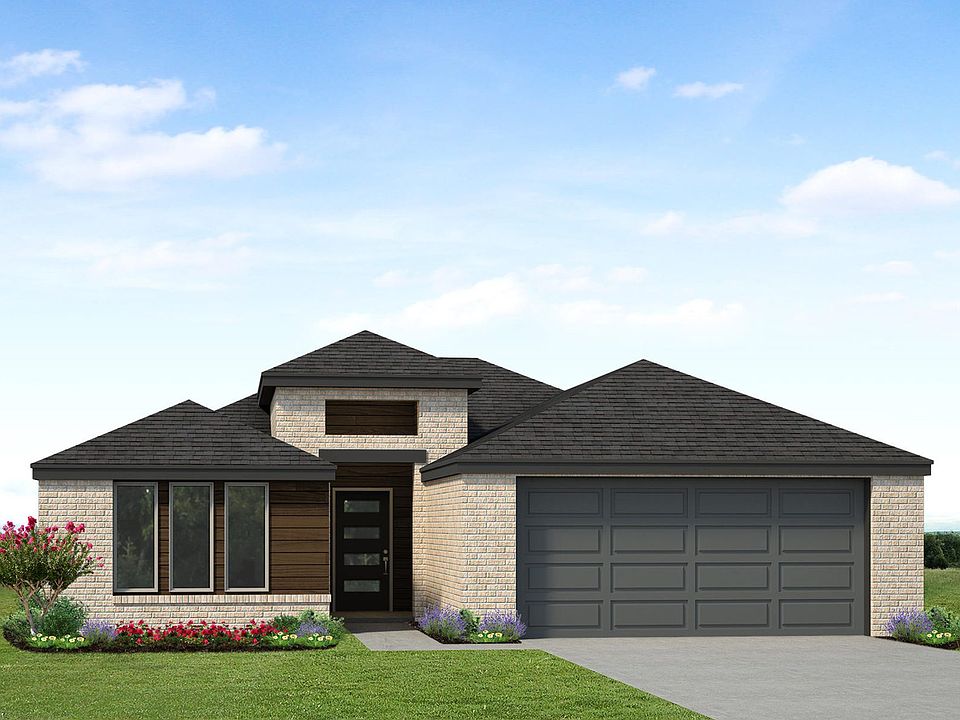 A single-story modern house with a brick exterior, dark roof, and large garage door. The front yard