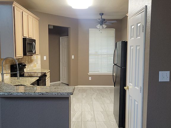 Kitchen showing sink