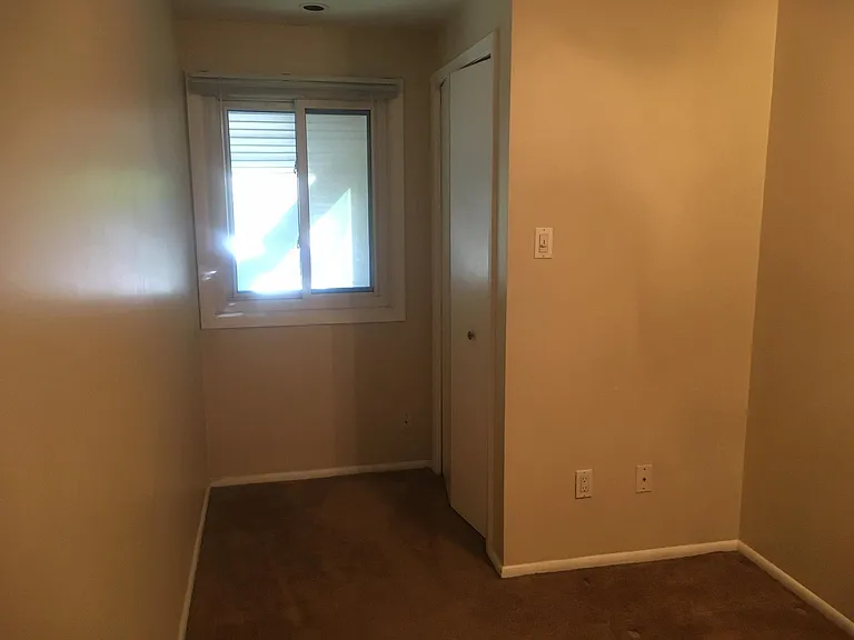 One of two closets in middle bedroom
