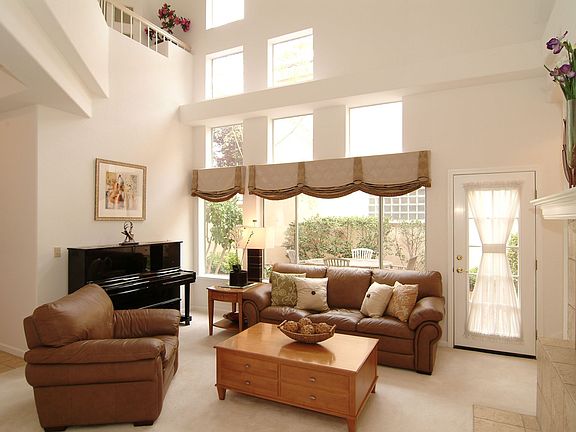 Family Room w/Fireplace and High Ceiling