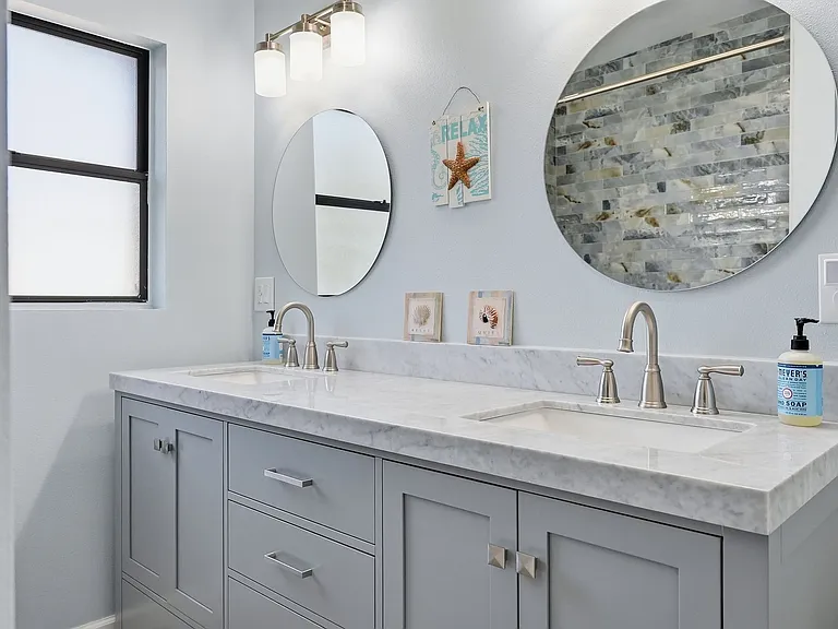 Brand new bathroom with marble double vanity - just outside the bedrooms.