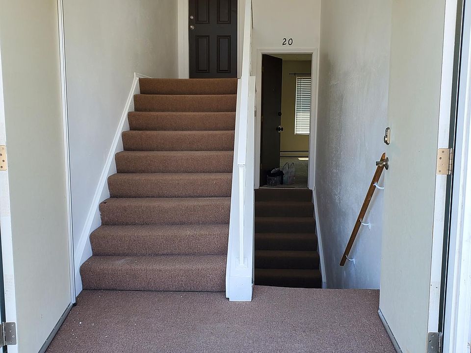 Secure hallway with code access. Laundry room downstairs