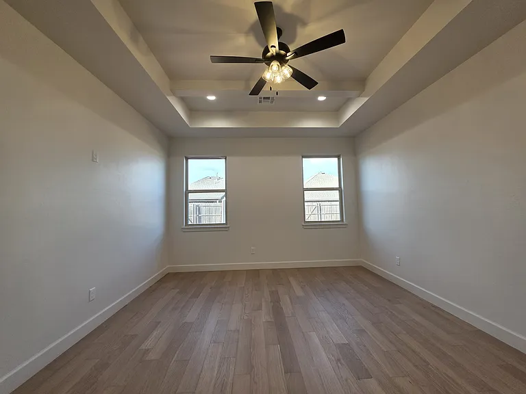 Primary/Master Bedroom with tray ceiling