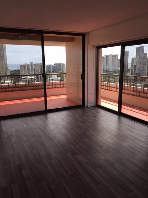 Wrap-around balcony overlooking Waikiki, the ocean, Ala Wai