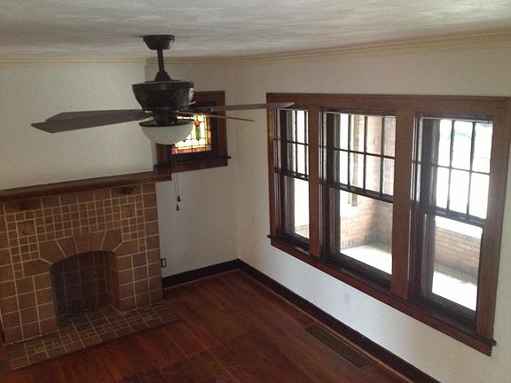 Entry/living room with wood floors and trim