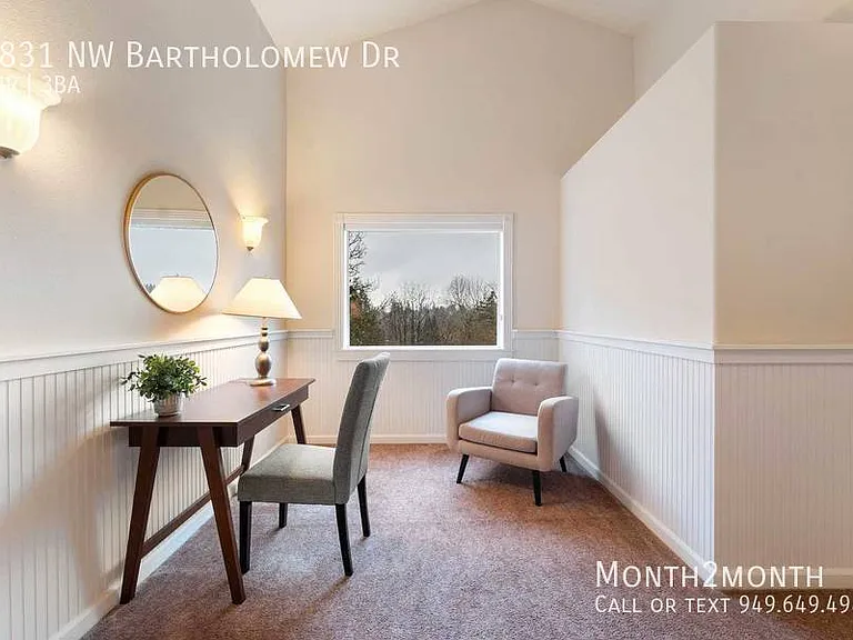 9831 NW Bartholomew Dr — Photo 20